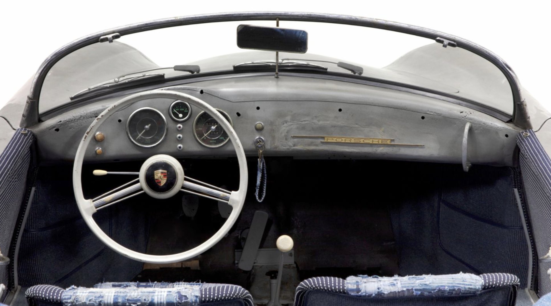 Dashboard of the 356 Bonsai: ivory steering wheel, bare metal dash and indigo patchwork upholstery